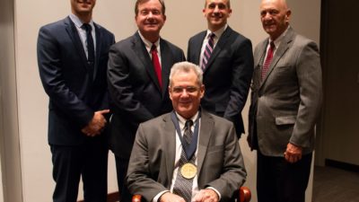 Smeltzer poses with (from left) Daniel G. Meeker, Ph.D.; C. Lowry Barnes, M.D.; James E. Cassat, M.D., Ph.D.; and John J. Iandolo, Ph.D.