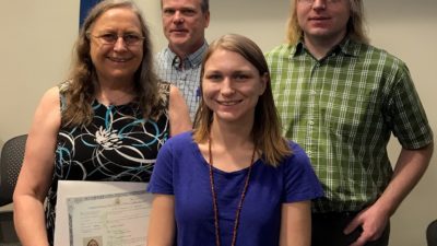 Leonie DeClerk, D.N.P., RN, APRN, and her family at the naturalization ceremony in Memphis.