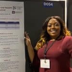 Daija Green, a UAMS SRI participant from Jackson State University, with her research poster at ABRCMS 2019 in Anaheim, California.