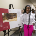 Amari Doss joined her classmates to present their posters to graduation attendees and other visitors.