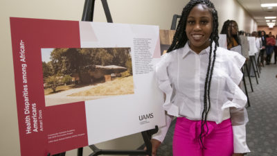 Amari Doss joined her classmates to present their posters to graduation attendees and other visitors.