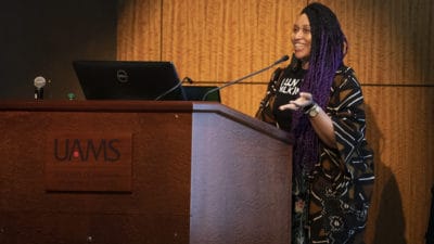 Guest speaker Crystal C. Mercer speaks about public service during the UAMS Martin Luther King Jr. Day Celebration.