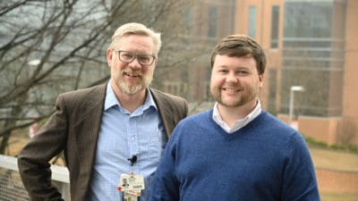 Brad Martin, left, and Corey Hayes recently had their research into the effectiveness and risks associated with increasing the opioid dosage a patient receives published in two scientific journals.