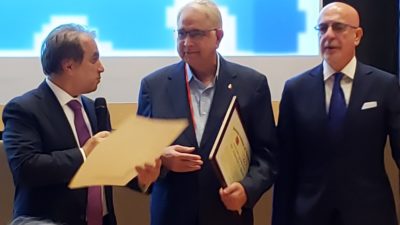 Dr. Mehta receiving award