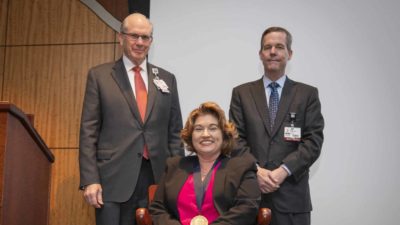 Overton-McCoy was presented with a commemorative medallion by UAMS Chancellor Cam Patterson, M.D., MBA and Christopher T. Westfall, M.D., executive vice chancellor and College of Medicine dean.