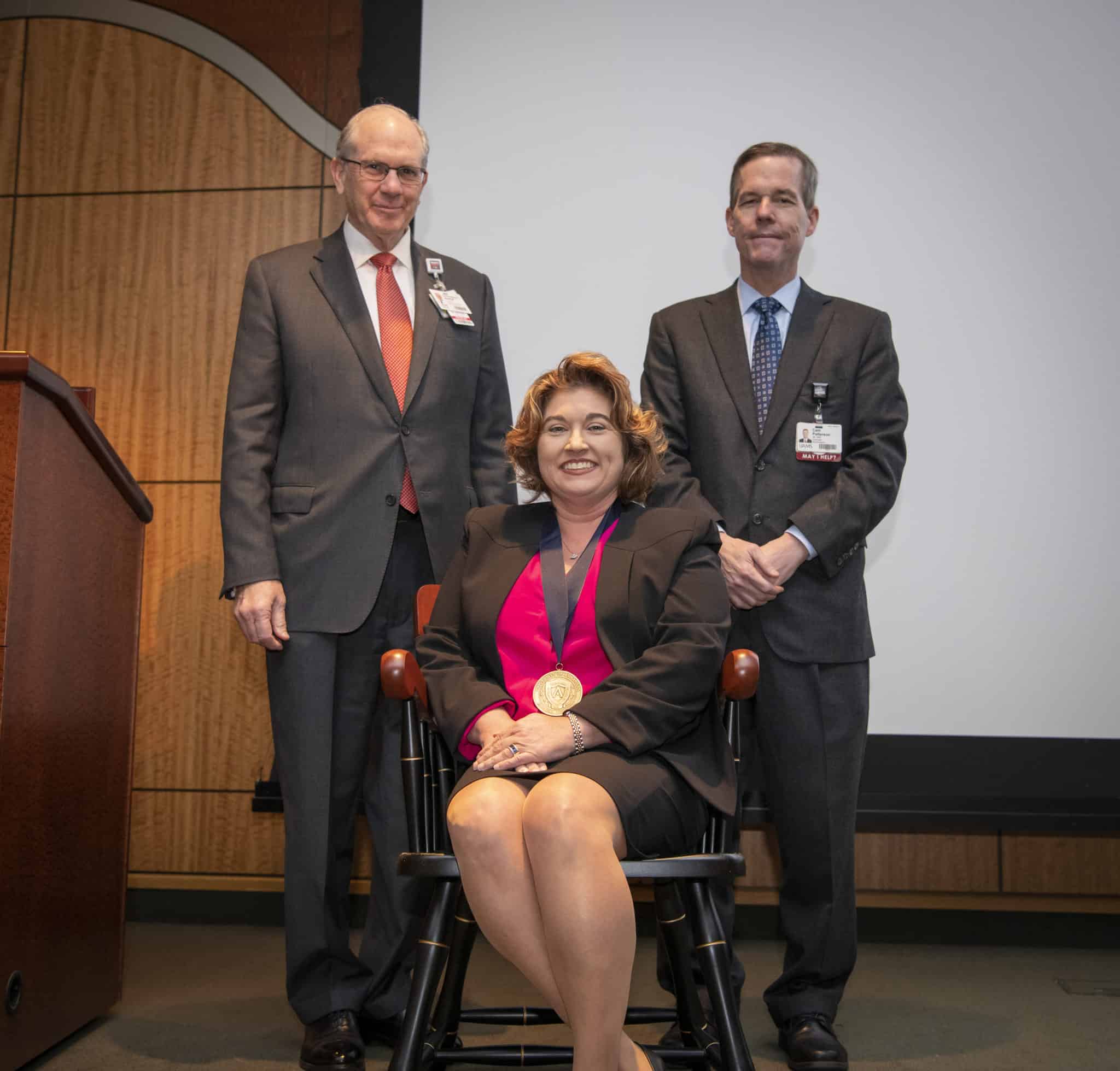 Overton-McCoy was presented with a commemorative medallion by UAMS Chancellor Cam Patterson, M.D., MBA and Christopher T. Westfall, M.D., executive vice chancellor and College of Medicine dean.