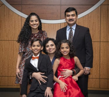 Mendiratta with her family: daughter Pallavi Prodhan and husband Parthak Prodhan, M.D. (back row), and twins Pia and Pranav Prodhan (front row).