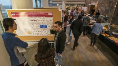 Crowd shot of poster session from above