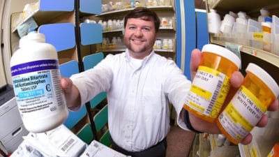 Pharmacist Dr. Corey Hayes and colleagues found that higher opioid doses did not bring more pain relief—but did increase the risk of harmful side effects. (Photo by Jeff Bowen)