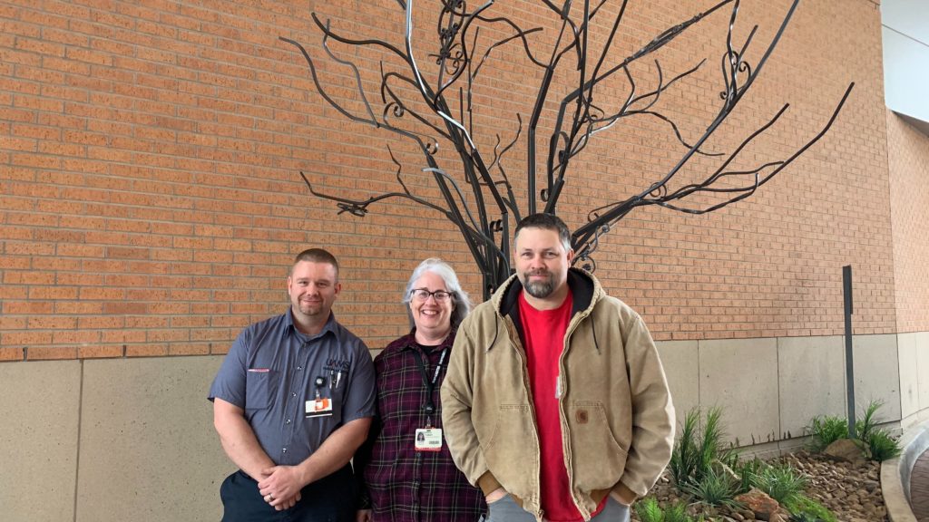 Eric Hale, Penny Talbert and Kenneth Bailey created this tree sculpture from wrought iron saved from the homes along Pine and Cedar.