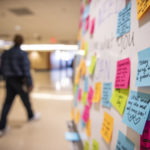 Kindness Walls scattered around campus urged employees to take a positive note and leave one in its place.