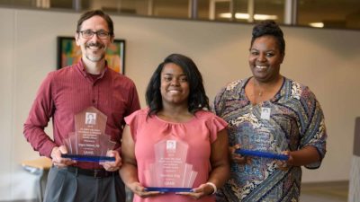 Greg Robinson (left) was the faculty recipient of the Dr. Edith Irby Jones Excellence in Diversity and Inclusion Award for his work with a transgender language clinic.