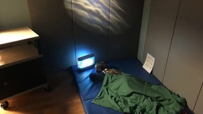 Patient uses sensory deprivation room