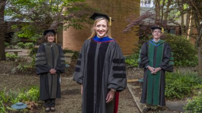 Chancellor's Teaching Award winner Tiffany Huitt, Ph.D., with Stephanie Gardner, Pharm.D., Ed.D., and Cam Patterson, M.D., MBA.