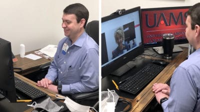 Jordan Weaver, M.D., uses a digital health video connection to talk to a colleague. Weaver helped lead the digital health effort at the UAMS Family Medical Center in Batesville.