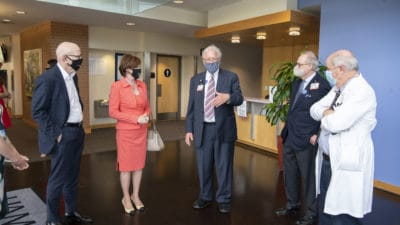George and Linda Gleason (at left) chat with G. Richard Smith, M.D. (center), David Ashmore and R. Lee Archer, M.D., prior to the presentation of a $100,000 check to be split equally between the Psychiatric Research Institute and Department of Neurology.