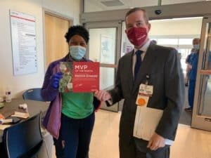 Chancellor Cam Patterson, M.D., MBA, recognizes Kanisha as the MVP of the Month.