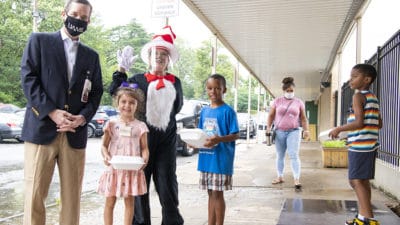 Chancellor Cam Patterson, M.D., MBA, visited with children who attended the UAMS Day Camp at Pulaski Heights Middle School for a celebration on the last day of camp.