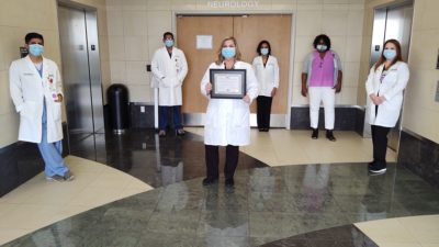 The UAMS Stroke Program care team with the Get with the Guidelines Target: Stroke Honor Roll Gold Plus award.