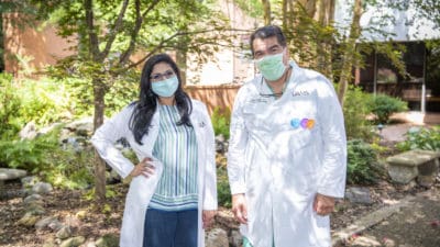 Dr. Paydak and Dr. Kovelamudi outdoors