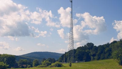 Communication tower standing tall in the country side of Alabama.