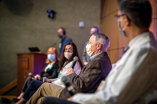 Robert Hopkins, second from right, answers a question during the panel discussion at the Chancellor's Town Hall.