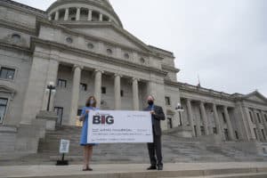 Martha Hill, a member of the Winthrop P. Rockefeller Cancer Institute's board of advisors, poses with Michael J. Birrer, M.D., Ph.D., director of the Institute, following the recent check presentation by the Republican Women's Legislative Caucus at the Arkansas State Capitol.