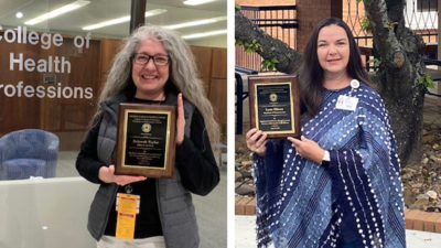 Deborah Taylor, left, and Lynn Ellison display their 2021 Staff Excellence Awards.