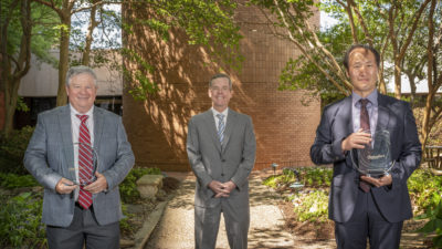 Mick Tilford, Ph.D., Chancellor Cam Patterson, M.D., MBA, and Sung Rhee, Ph.D.