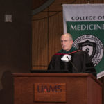 Christopher Westfall, M.D., outgoing dean of the College of Medicine, addresses his last class of graduates.
