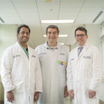 Dinesh Vorungati, left, with Hakan Paydak, M.D., center, and Subhi Al'Aref, M.D.