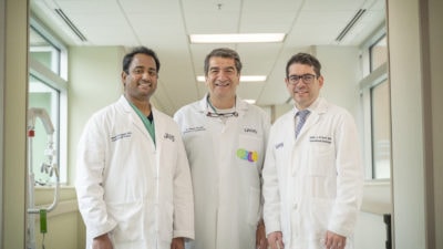 Dinesh Vorungati, left, with Hakan Paydak, M.D., center, and Subhi Al'Aref, M.D.