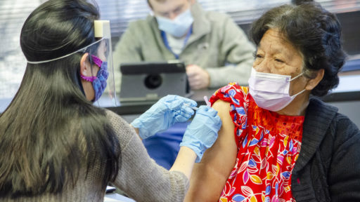 A Marshallese resident in Northwest Arkansas receives a COVID-19 vaccine.