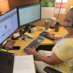 Administrative Coordinator Suzi Rook updates a schedule for AR-Connect’s therapists.