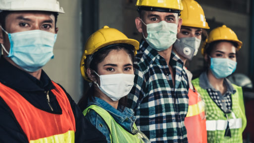 Workers with face masks