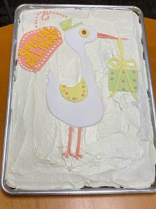 A stork cake, made by Glasgow, announces the imminent arrival.