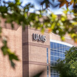 The Little Rock campus of UAMS in early fall 2020, as viewed through the branches of a tree along Hooper Drive, was home to many positive developments in 2021.