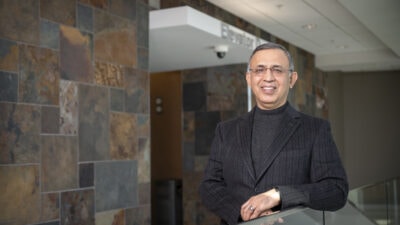 Omar Atiq, M.D., standing inside the Cancer Institute