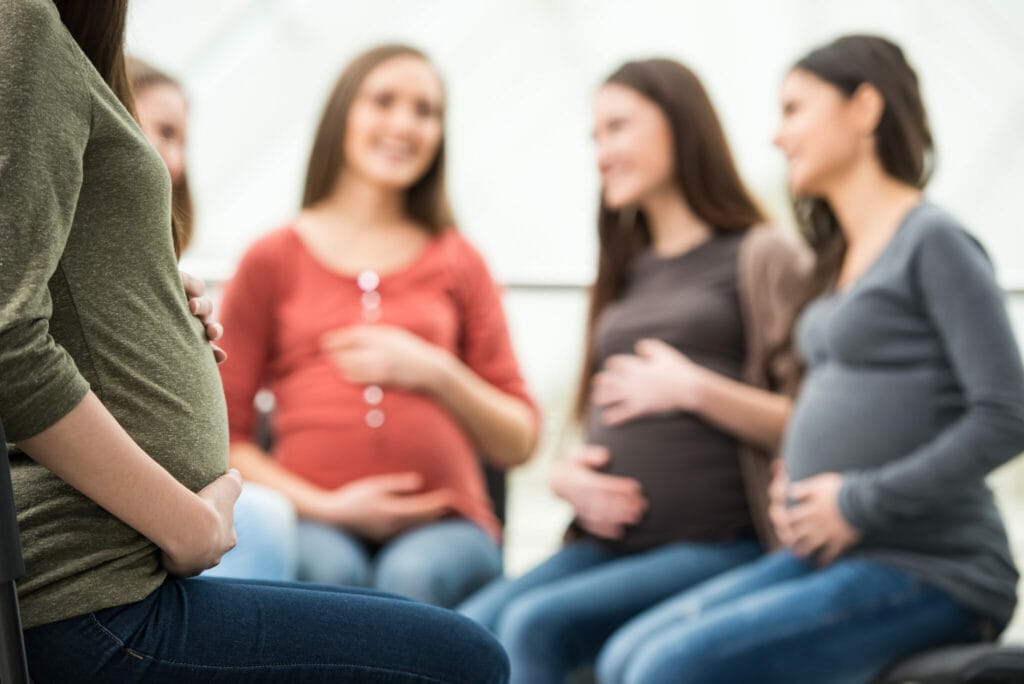 Group of Pregnant Women with Midwife at Courses for Expectant Mothers  Indoors Stock Photo - Image of group, maternal: 215373184