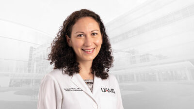 Spyridoula Maraka, M.D., in white coat
