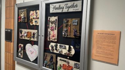 The Healing Together board is displayed in the College of Nursing.