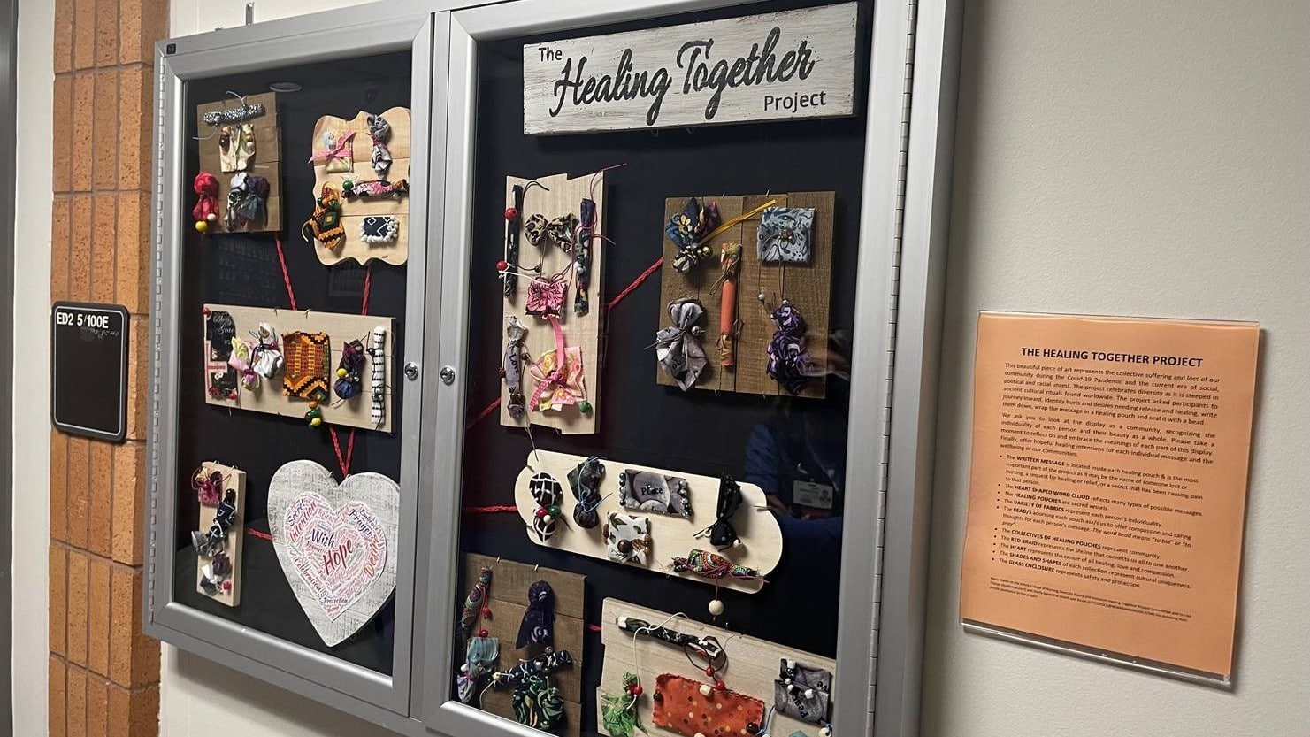The Healing Together board is displayed in the College of Nursing.