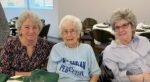 Margaret Alexander, 103, with her daughters at a Centenarian Celebration luncheon, hosted by Presbyterian Village and the UAMS Donald W. Reynolds Institute on Aging.