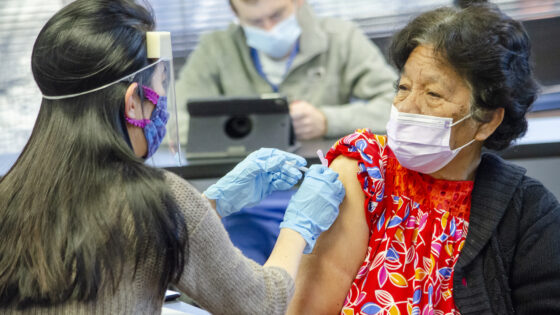 A Marshallese resident in Northwest Arkansas receives a COVID-19 vaccine shot.