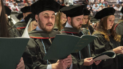 The College of Pharmacy Class of 2022 recites the Oath of a Pharmacist at their May 20 convocation.