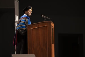 Ashok Philip, Ph.D., College of Pharmacy's associate dean of student services, serves as master of ceremonies.