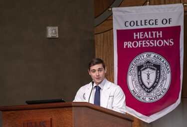 Physician Assistants Class of 2022 President Jason McBride addresses the Class of 2024 and the audience.