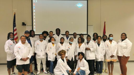 Students and workers from the University of Arkansas for Medical Sciences’ Pathways Academy take a group photo June 24 at Southeast Arkansas College in Pine Bluff during the closing ceremony for their two-week summer intensive camp. The students are part of Pathways’ Research Academic Mentoring Pathway for Underrepresented Minorities (RAMP-UP) program.