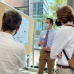Nate Lemke discusses his summer research project at the ninth annual Central Arkansas Undergraduate Summer Research Symposium at UAMS. He conducted his summer research at Hendrix College.