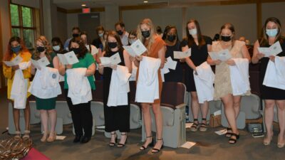UAMS College of Nursing students in the accelerated BSN program recite the Nightingale Pledge